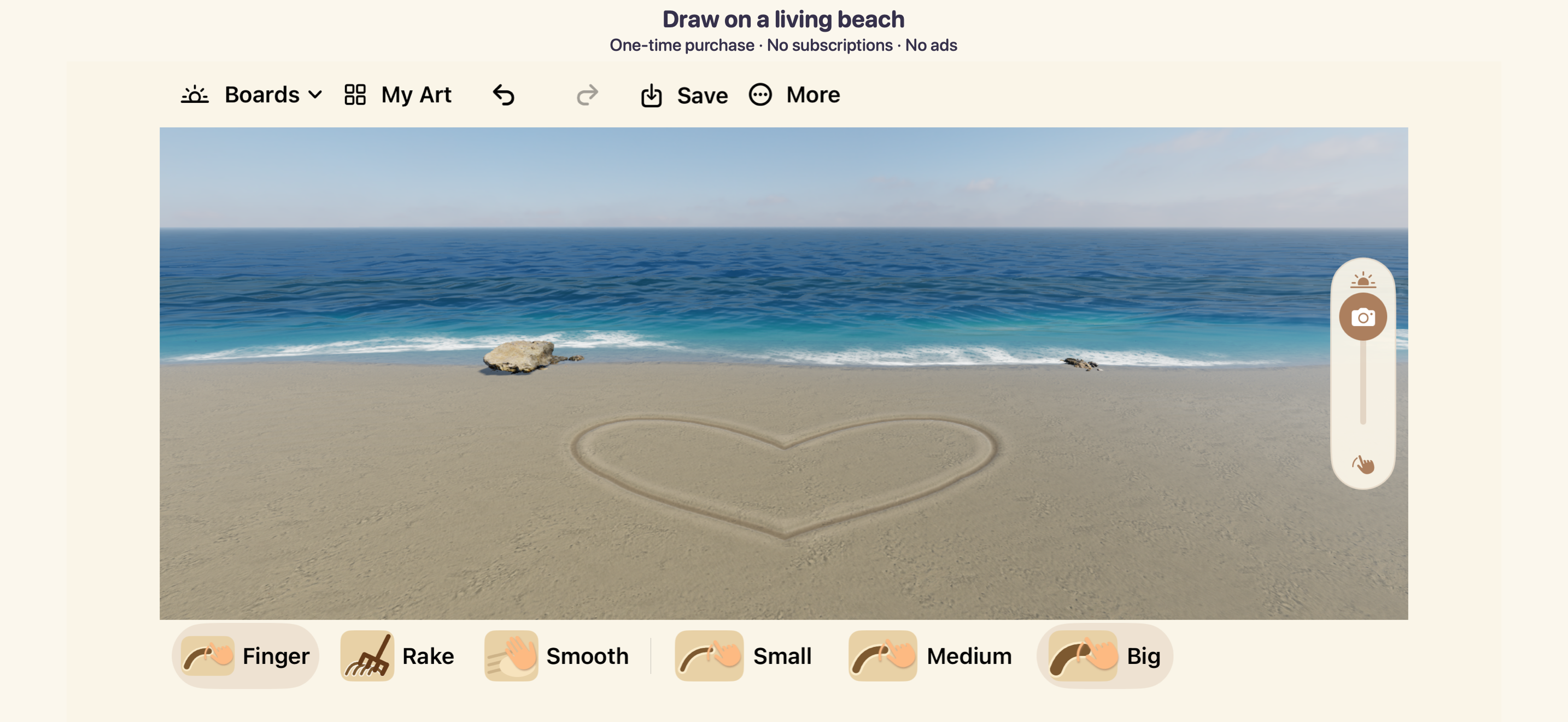 A heart carved in the app's beach sand, with ocean waves and Finger, Rake, and Smooth tools